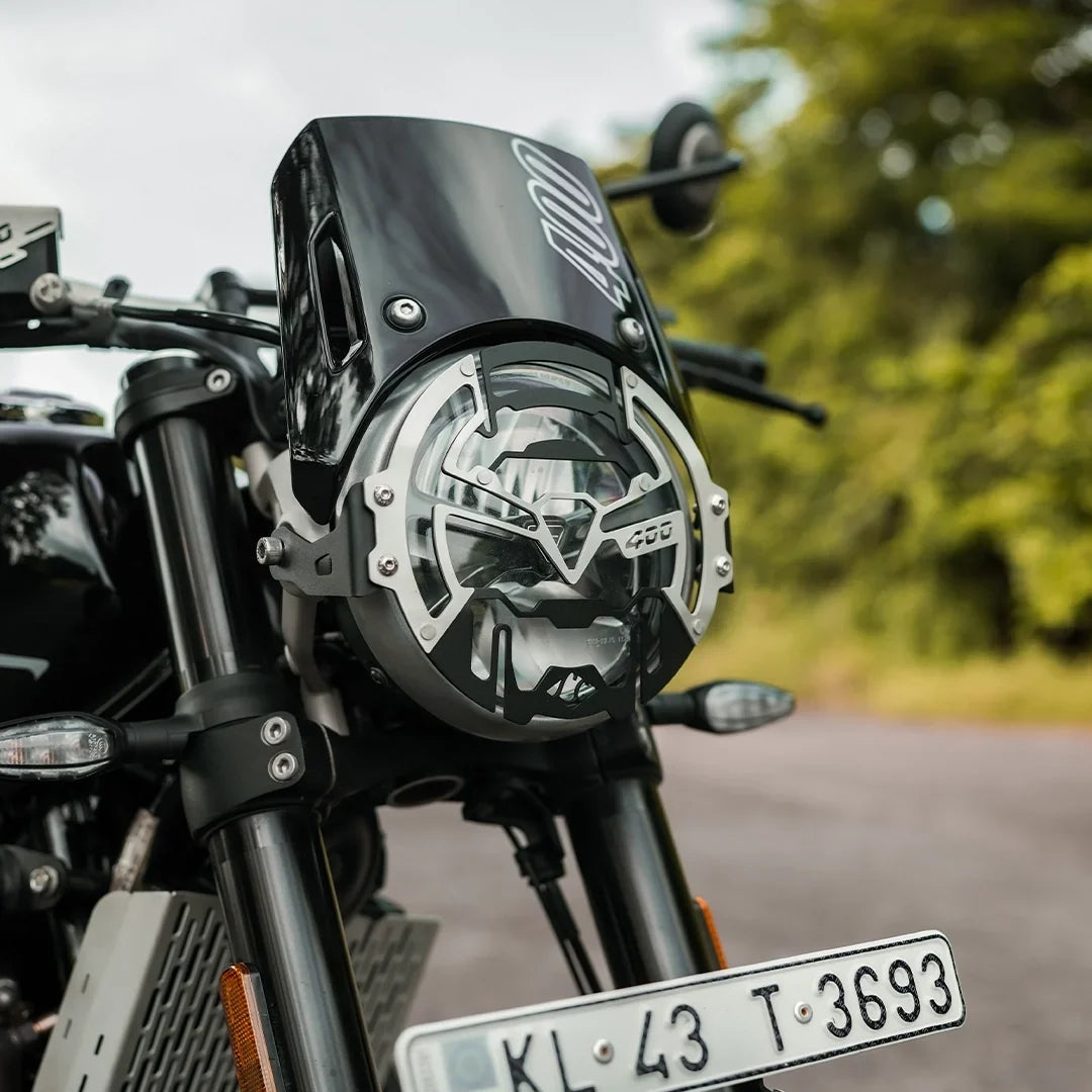 LEGUNDARY TRIUMPH TRACKER 400 COSMIC HEADLIGHT GRILL BLACK & SLIVER,
